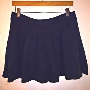 Black pleated skater skirt