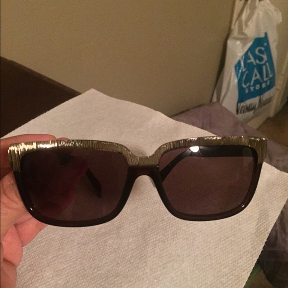 Alexander McQueen glasses.