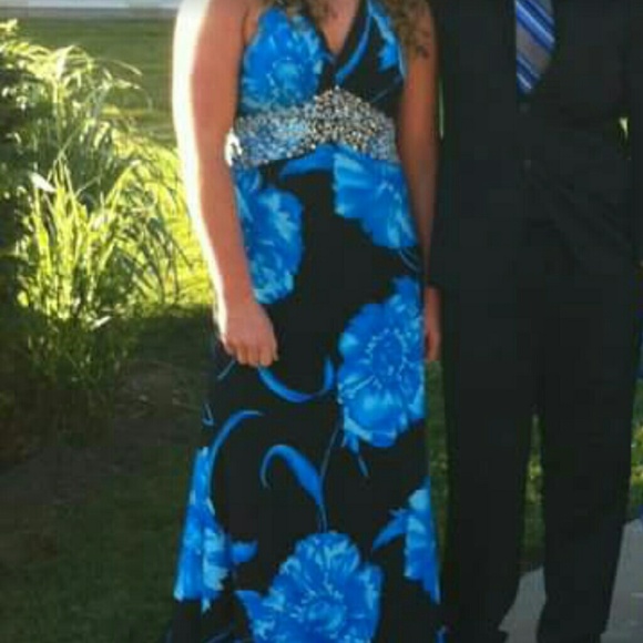 Long black with blue flowers prom dress.