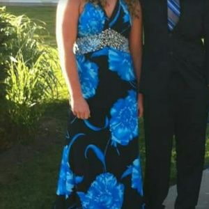 Long black with blue flowers prom dress.