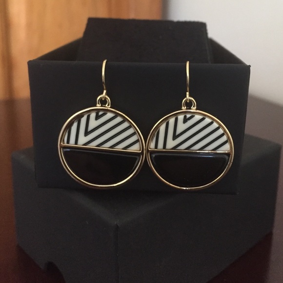 Kenneth Cole earrings , new in the box.