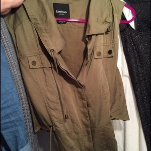 Green BEBE vest with gold buttons