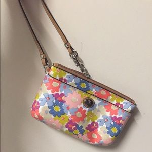 Coach wristlet- floral print.
