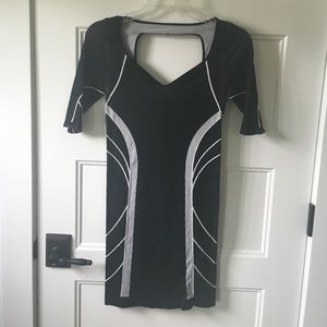 Black geometric mini dress.