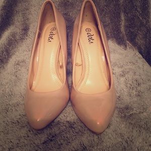 Brand new nude pumps.