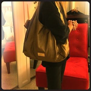 Gold Valentino Garavani bag. Excellent condition.