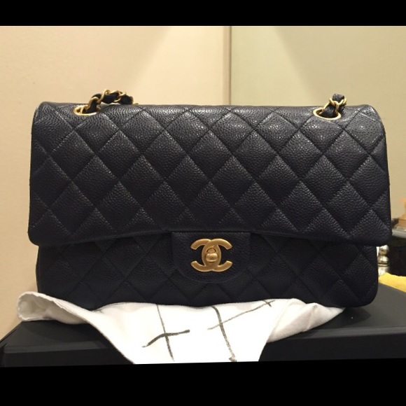 CHANEL
Medium Flap Handbag Caviar Navy Cross Body - Picture 2 of 4