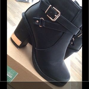 Black faux booties w/ gold metal heel