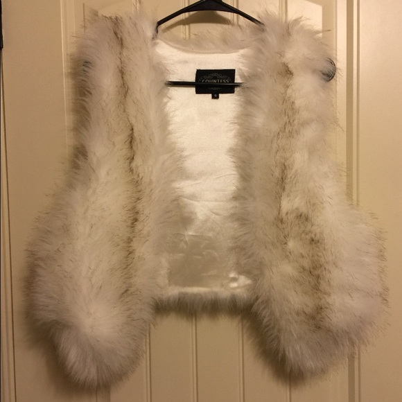 White fuzzy vest