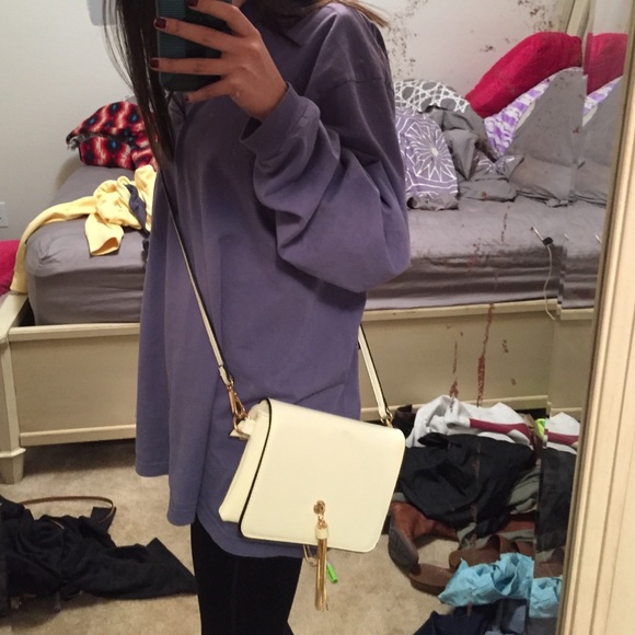 White tassle cross body purse