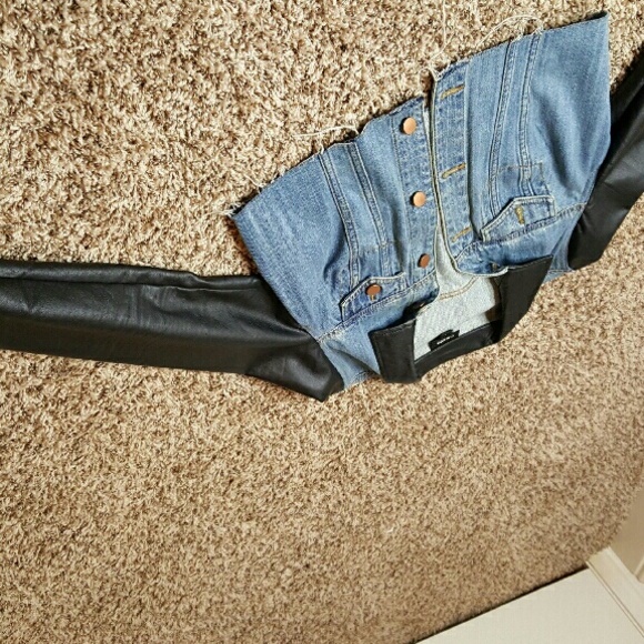 Denim jacket with faux leather sleves