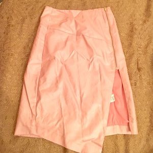 Small fitted Pink side zip skirt. Never Worn
