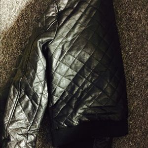 Leather jacket used once for couple of min .