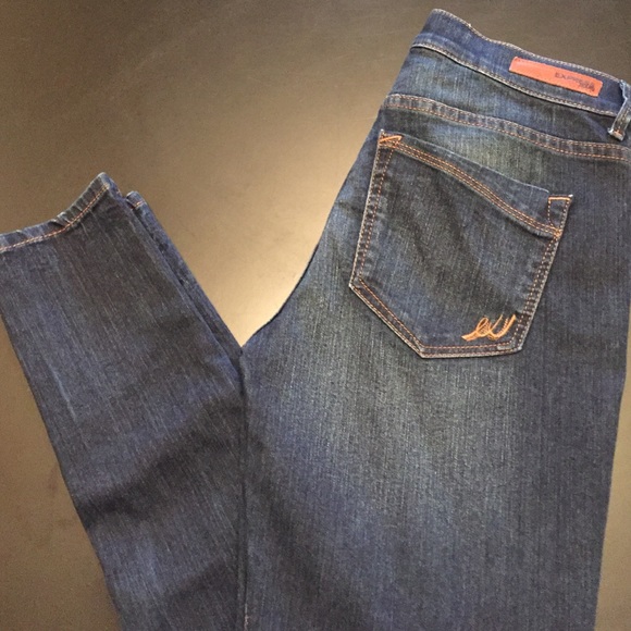 Express dark mid rise legging jeans. Size 4