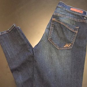 Express dark mid rise legging jeans. Size 4