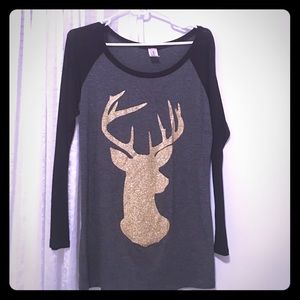 Sparkly deer head shirt.