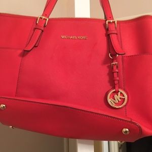 Red shoulder bag!