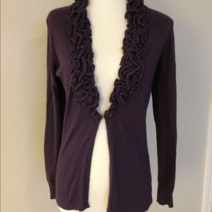 Purple cardigan with ruffle accents