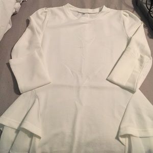 Long sleeve white boutique peplum top