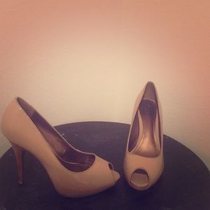 Nude peep toe pumps