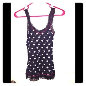 DKNY sheer black tank top with white hearts. DKNY sheer black tank top with white hearts.