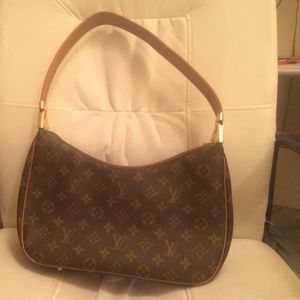 Louis Vuitton over the shoulder purse.