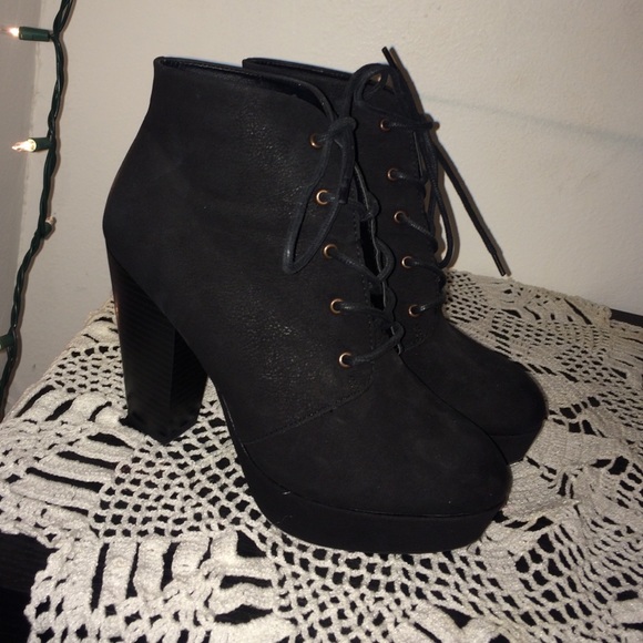 Black lace up high heel booties