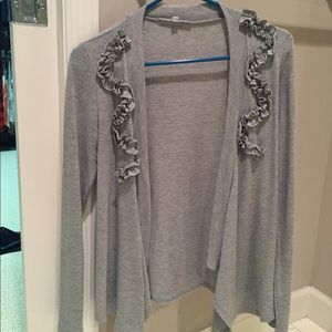 Gray cardigan.
