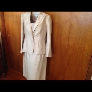 Professional taupe three piece suit. Le Suit