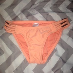 Peach bikini bottoms with gold detail