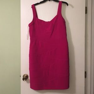 Pink strapped dress slightly above knee