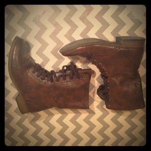 Brown combat boots.