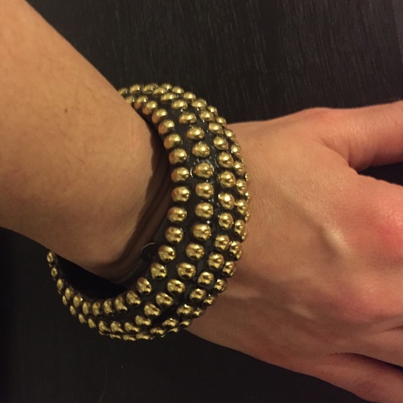 Wooden bangle with gold studs