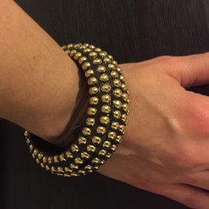 Wooden bangle with gold studs