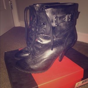 Edgy black lace up booties