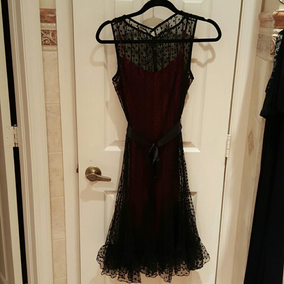 This dress is color red more like wine with black