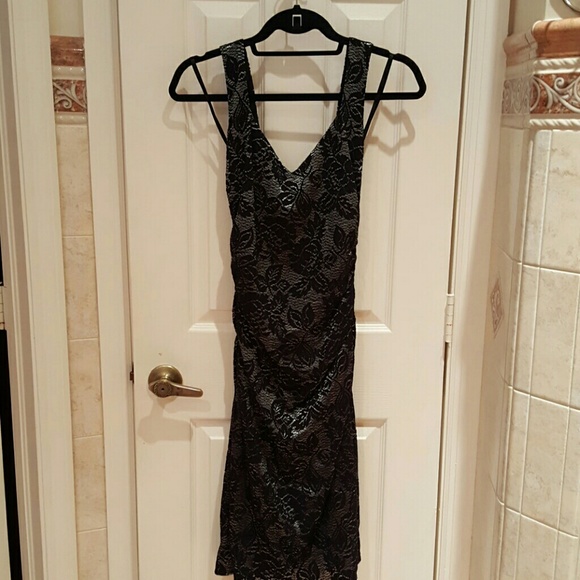 This is a black dress with gray and is perfect for