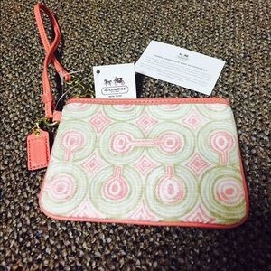 Coach pink wristlets wallet