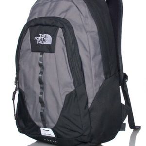 Grey north face vault back pack