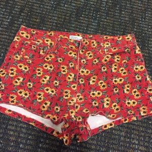 Red and yellow sunflower jean shorts
