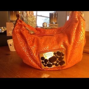 Kathy Van Zeeland Spice Gold Embossed Hobo