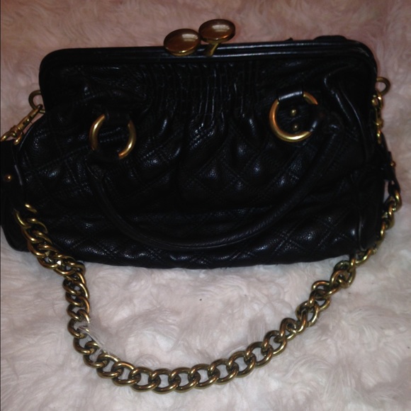 Used Marc Jacobs quilted leather purse.