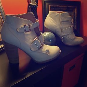 Cream colored booties with buckles!