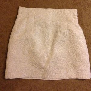 Very light cream skirt with silver designs