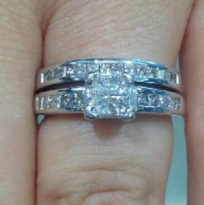 14k white gold and diamond engagement ring.
