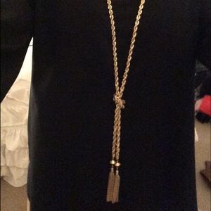 Long gold knot necklace