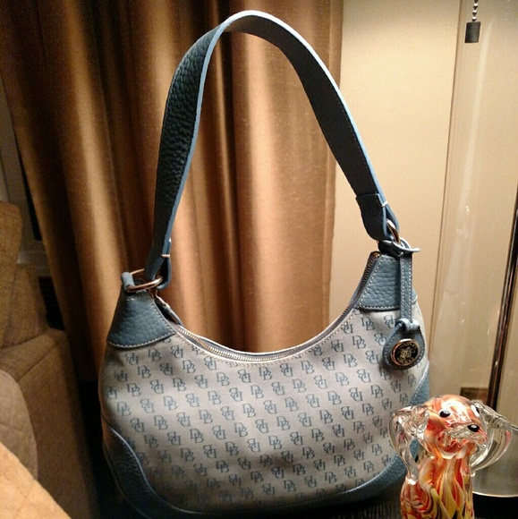 Price cut: Dooney Bourke zip bag