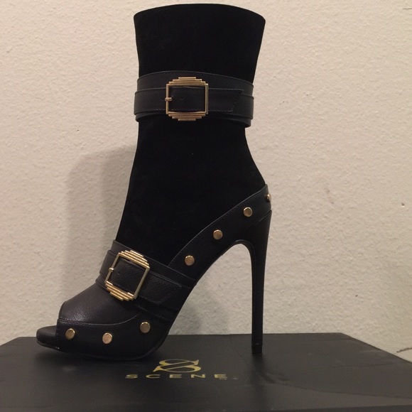 Faux suede peep toe booties. Brand new. Size 7.