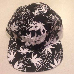 Funnugs black SnapBack with white pot leaves