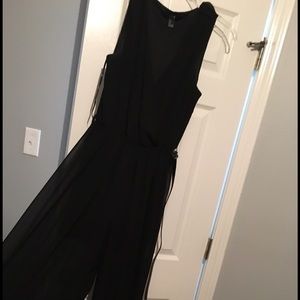 Black sheer jumper with brown belt